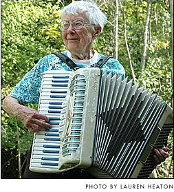 Mitzi playing the accordion